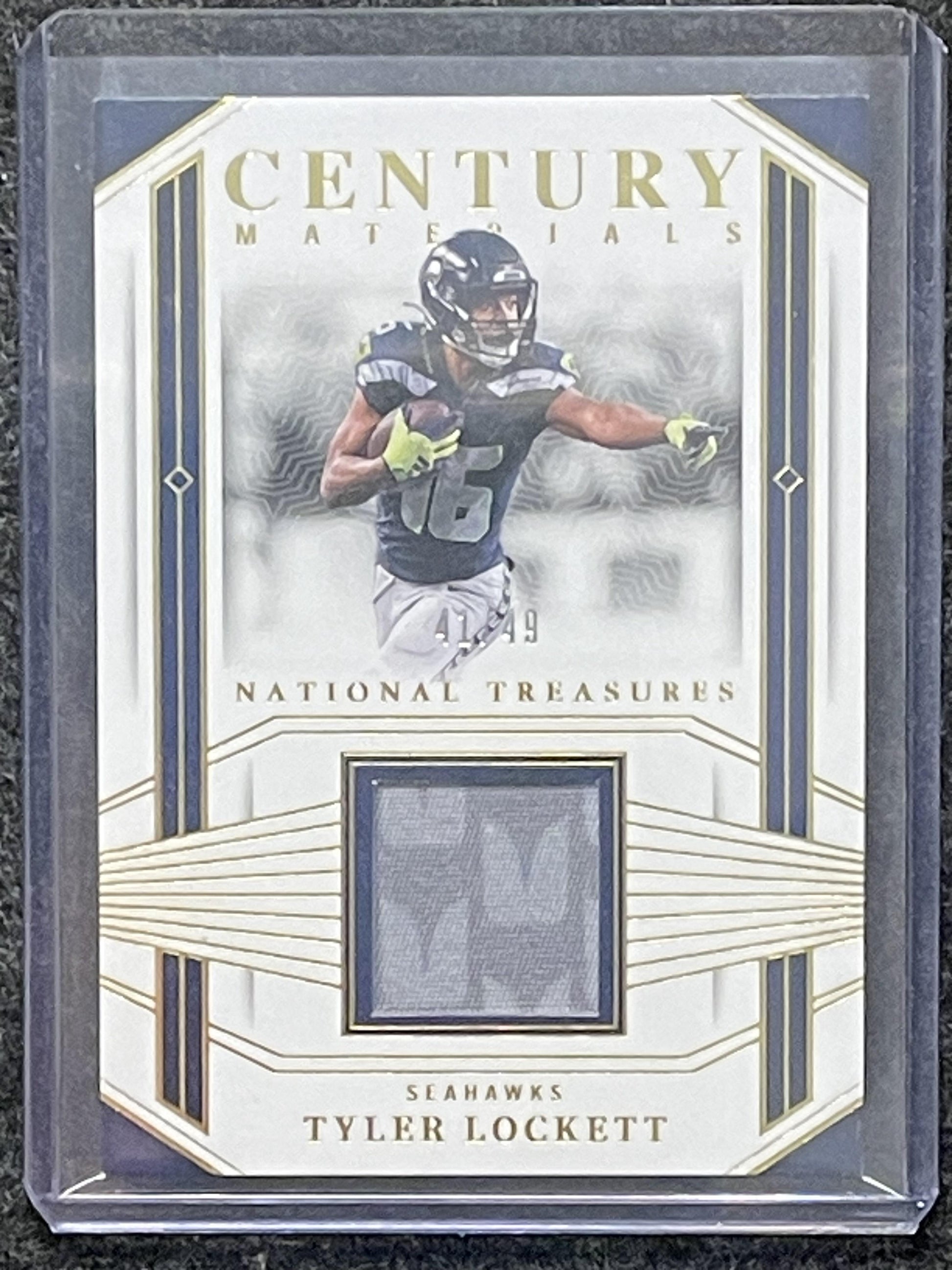 2023 Panini National Treasures #CEN-TLT Tyler Lockett Materials Gold #/49 Hawks
