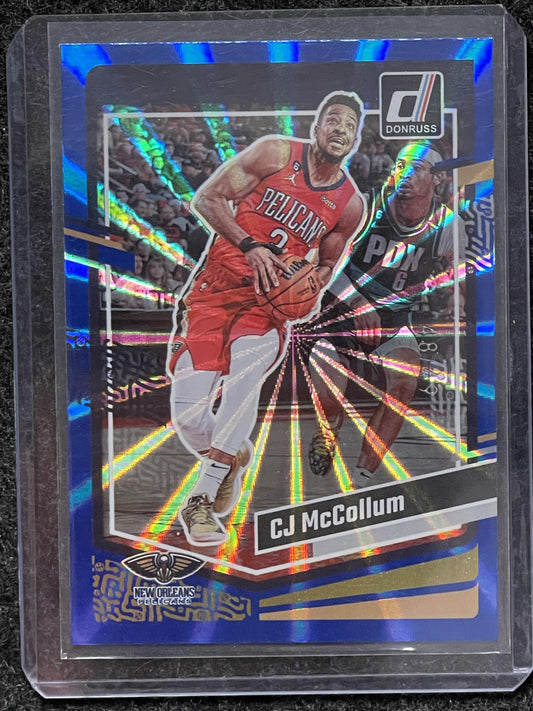 2023-24 Donruss #95 CJ McCollum Blue Laser Holo #/49 New Orleans Pelicans SN