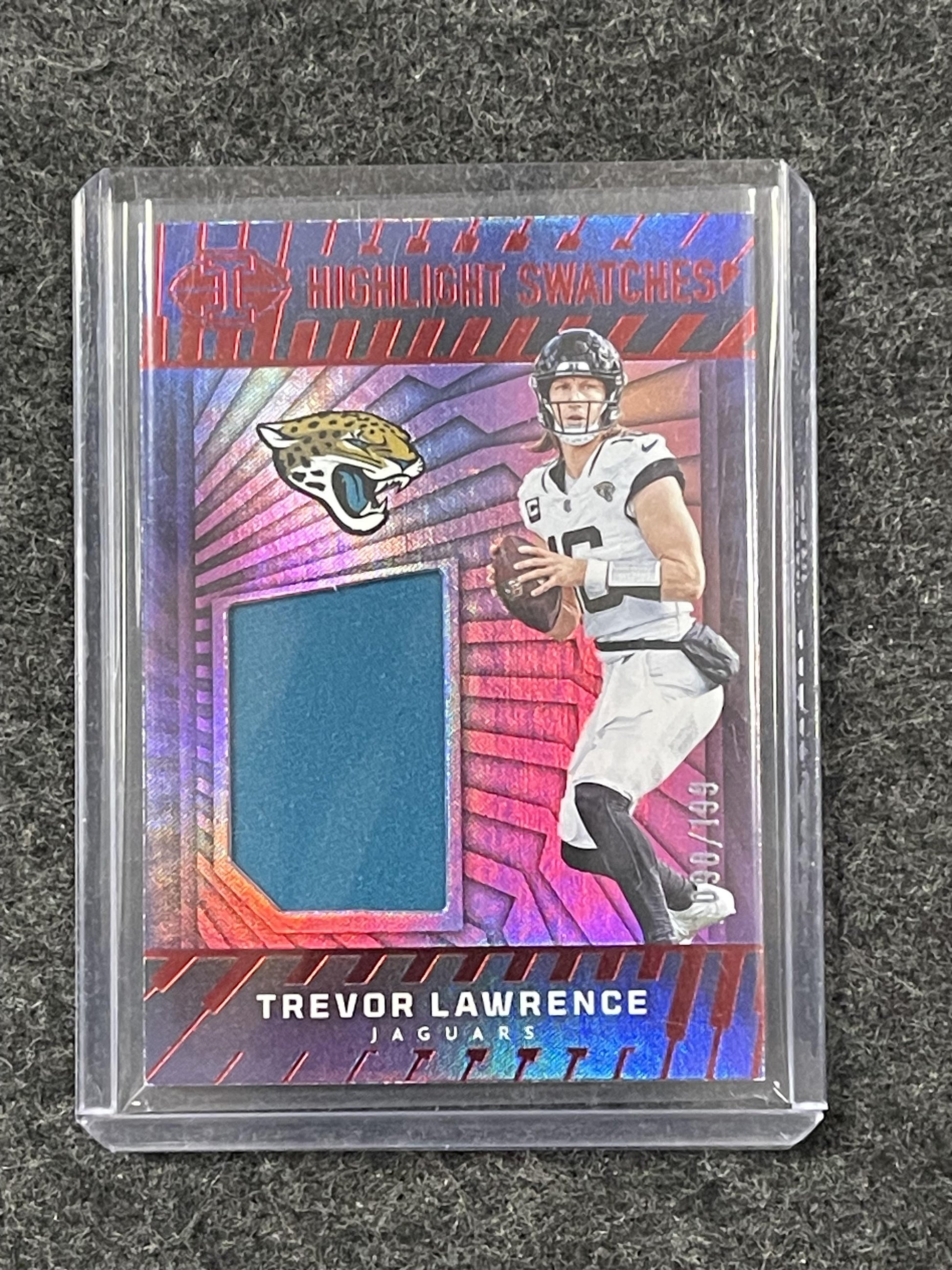 2024 Panini Illusions #HS-TLE Trevor Lawrence Highlight Swatches Red #/199 Jax