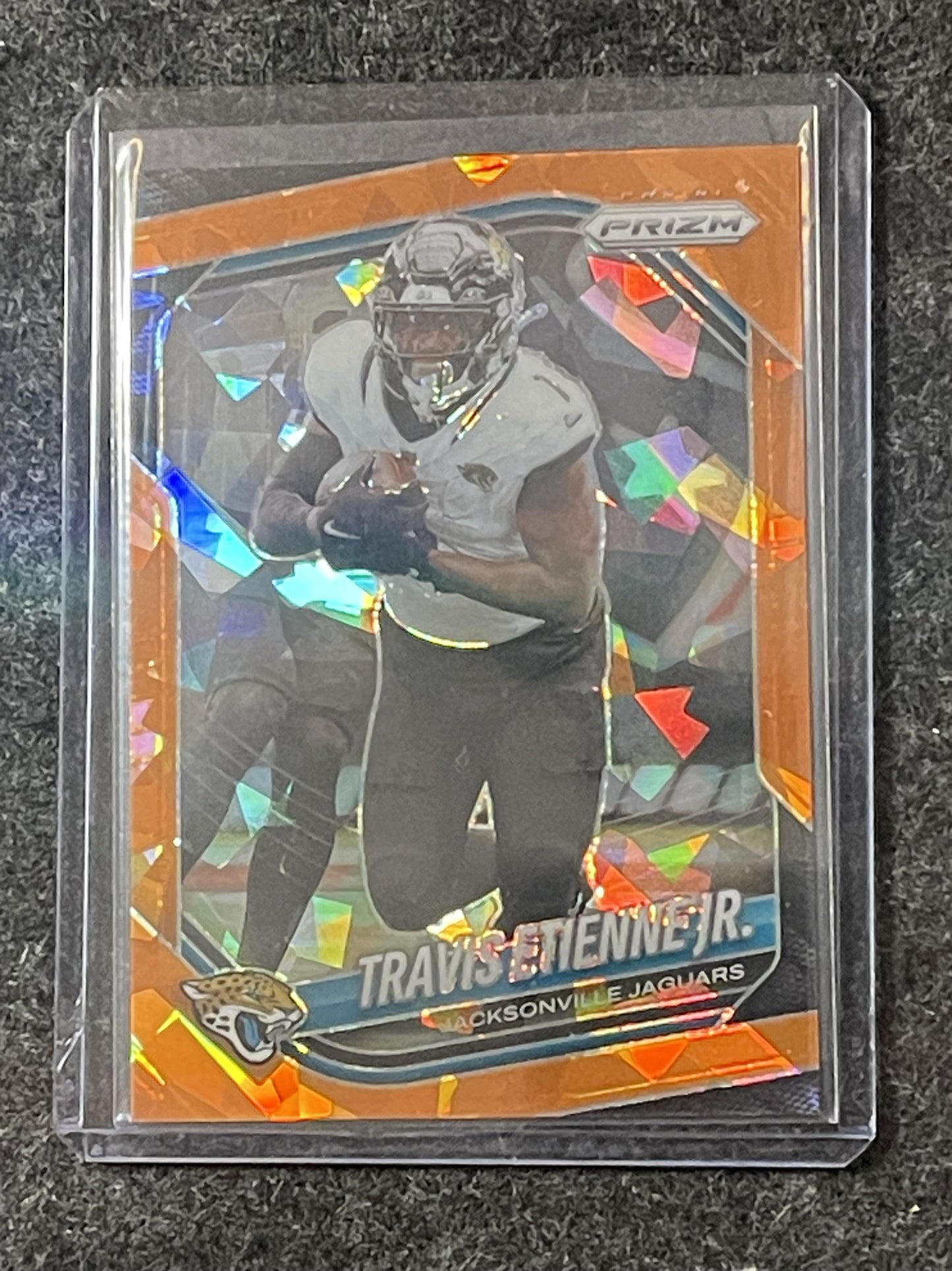2025 Panini Prizm #68 Travis Etienne Jr. Orange Ice Jacksonville Jaguars