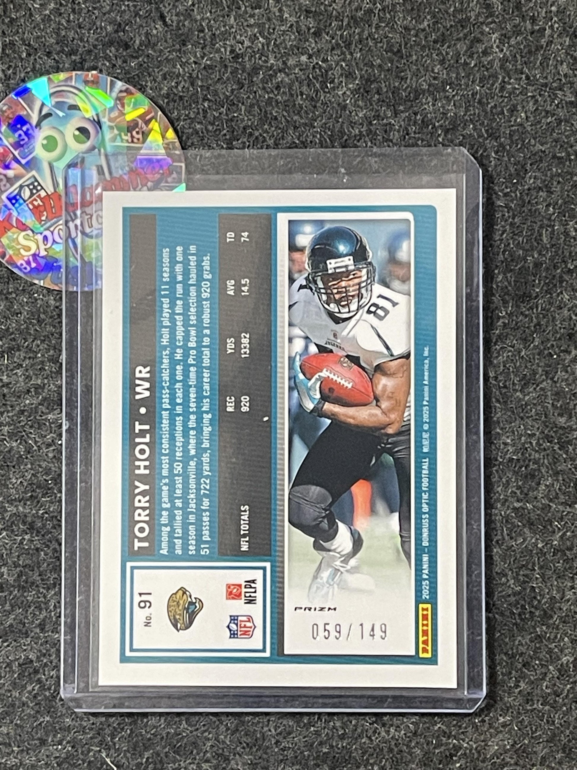 2025 Donruss Optic #91 Torry Holt Red #/149 Jacksonville Jaguars SN