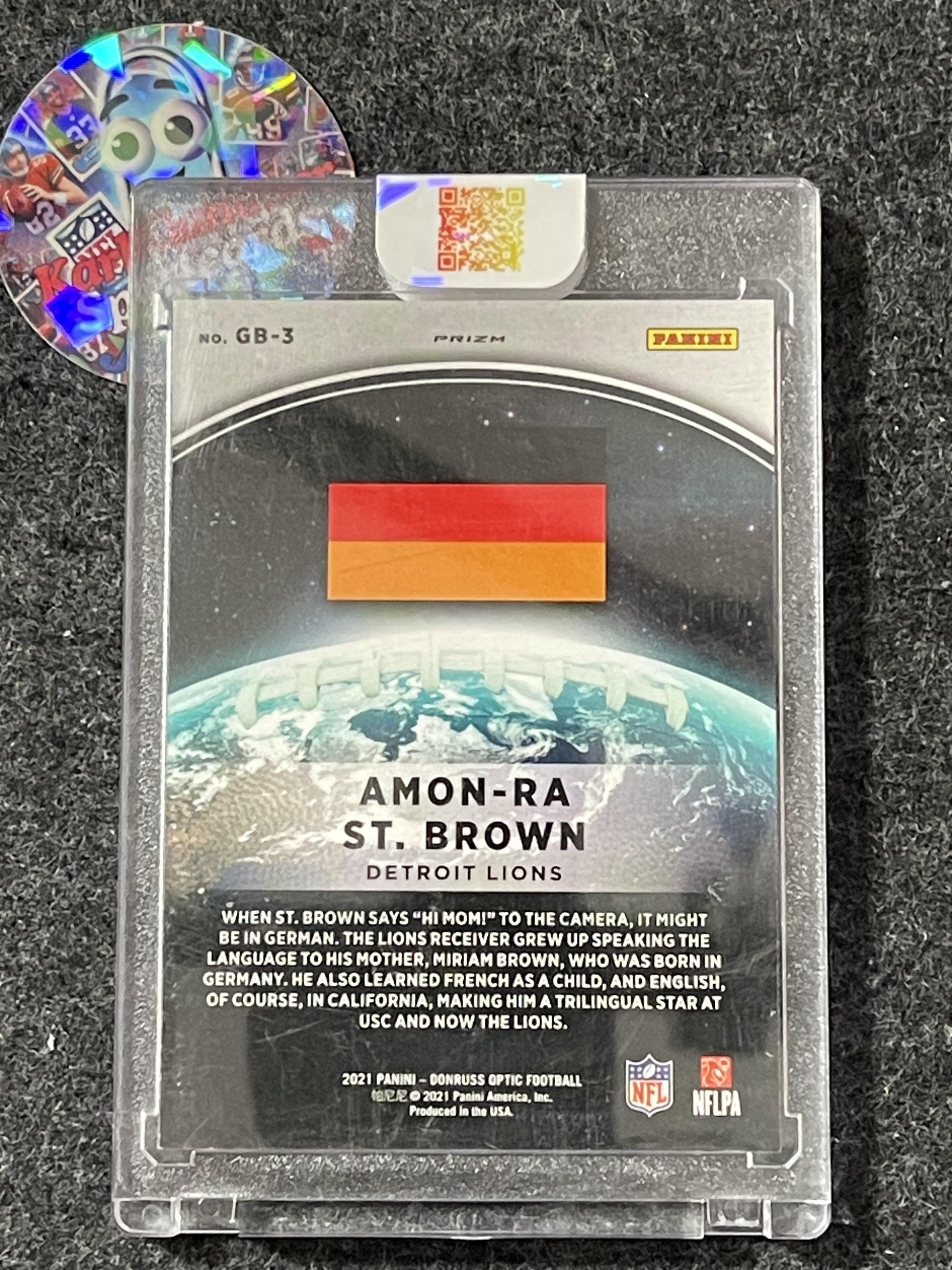 2021 Donruss Optic #GB-3 Amon-Ra St. Brown GloBall Detroit Lions