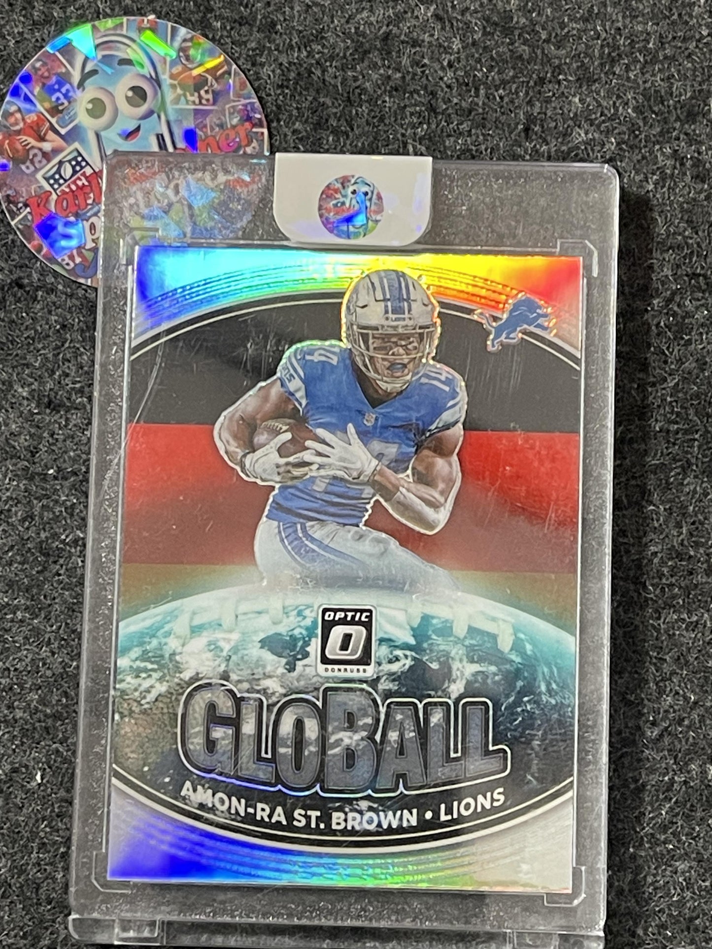 2021 Donruss Optic #GB-3 Amon-Ra St. Brown GloBall Detroit Lions