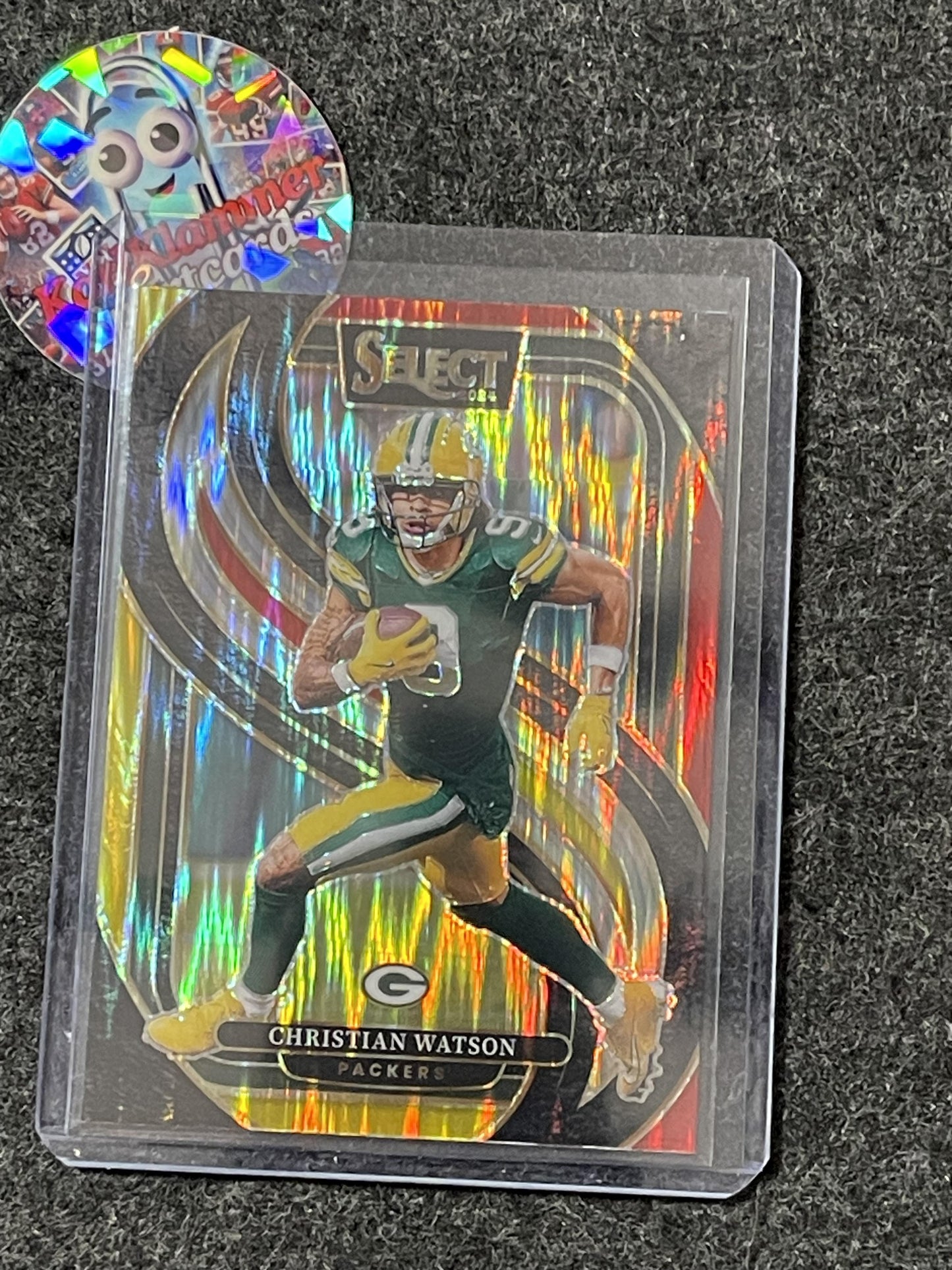 2024 Panini Select #138 Christian Watson Red & Yellow Prizm Shock Green Bay Packers