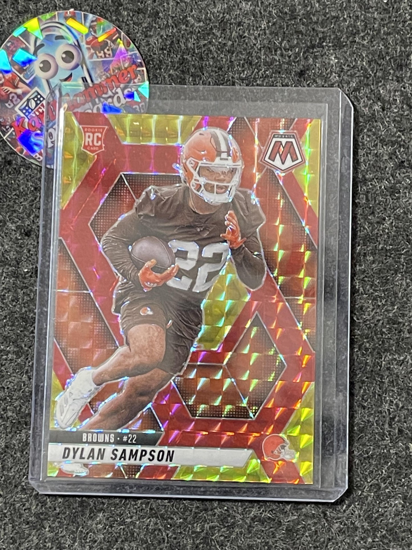2025 Panini Mosaic #355 Dylan Sampson Mosaic Choice Red & Yellow #/89 Cleveland Browns SN,RC