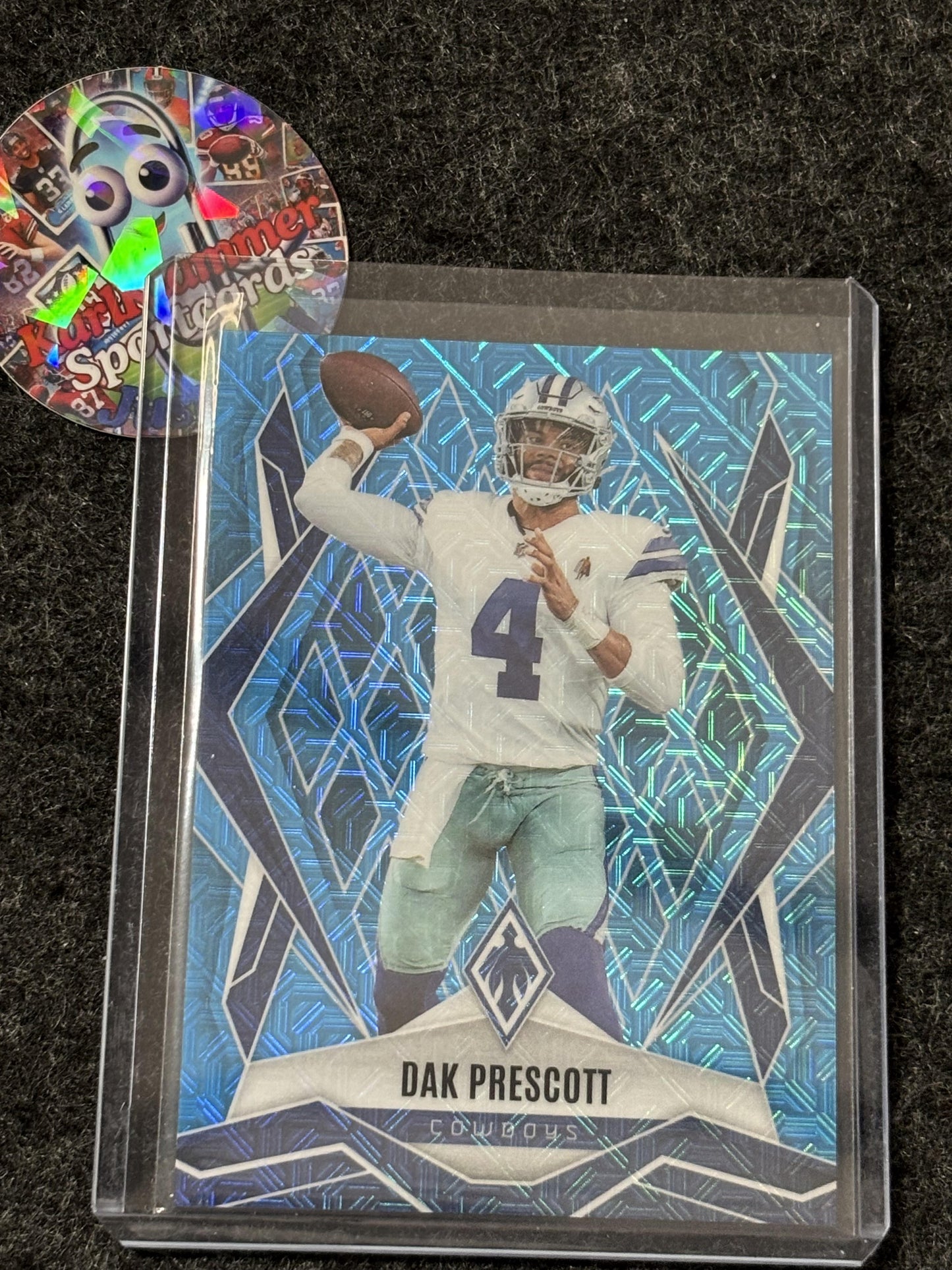2025 Panini Phoenix #29 Dak Prescott Light Blue Mojo Prizm #/85 Dallas Cowboys SN