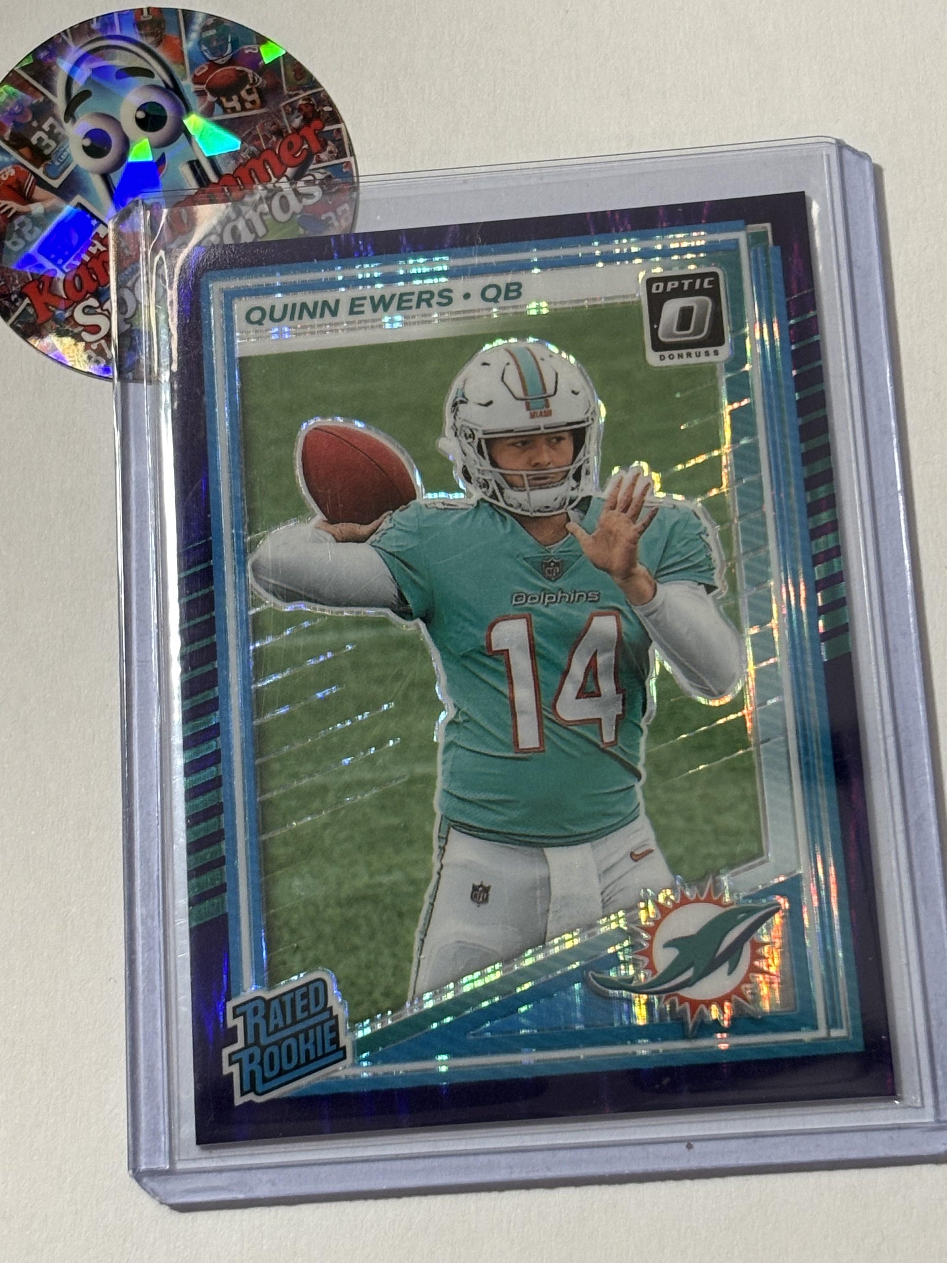 2025 Donruss Optic #213 Quinn Ewers Purple Shock Miami Dolphins RC