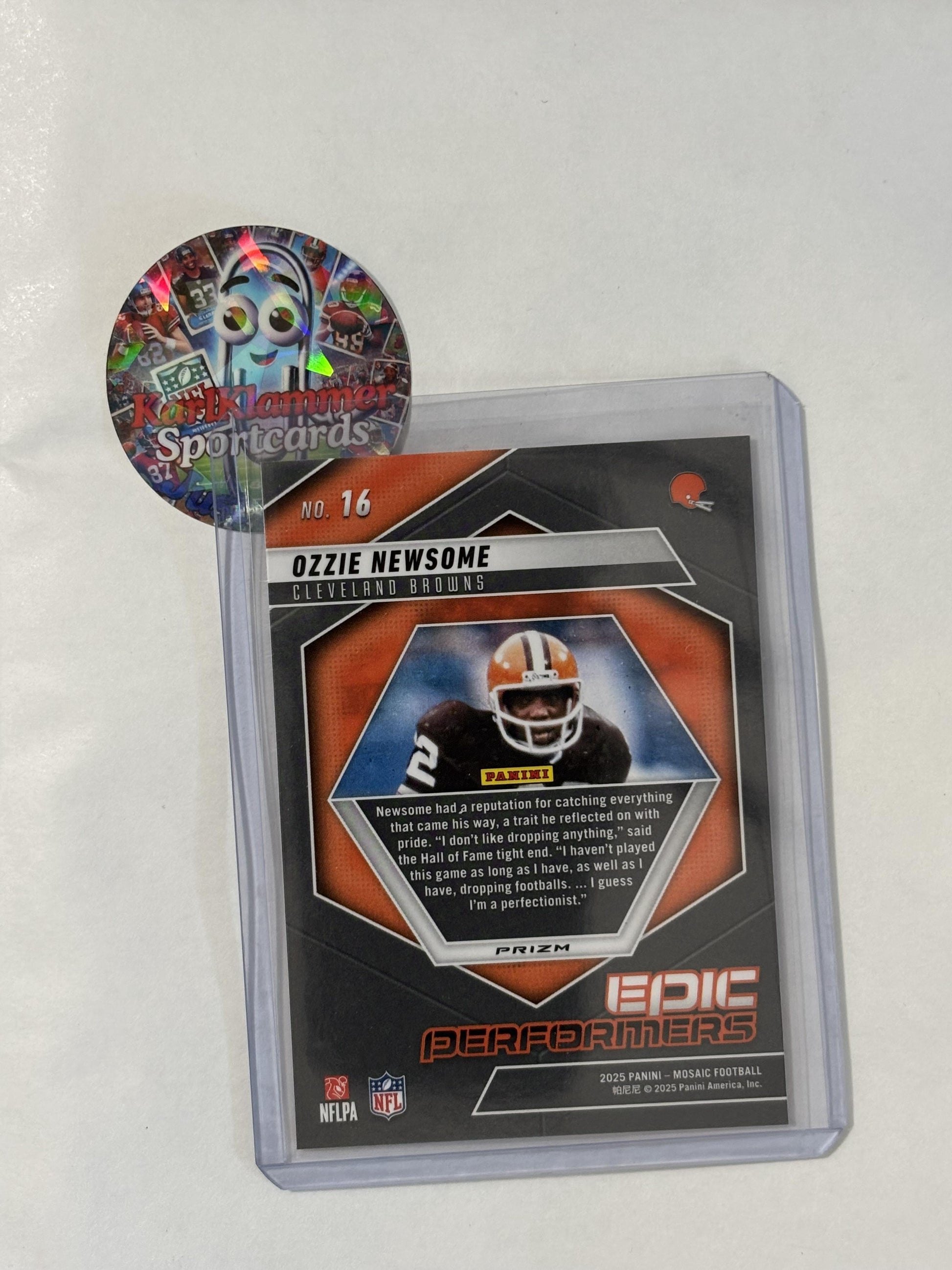 2025 Panini Mosaic #16 Ozzie Newsome Epic Performers Mosaic Orange Fluorescent Cleveland Browns