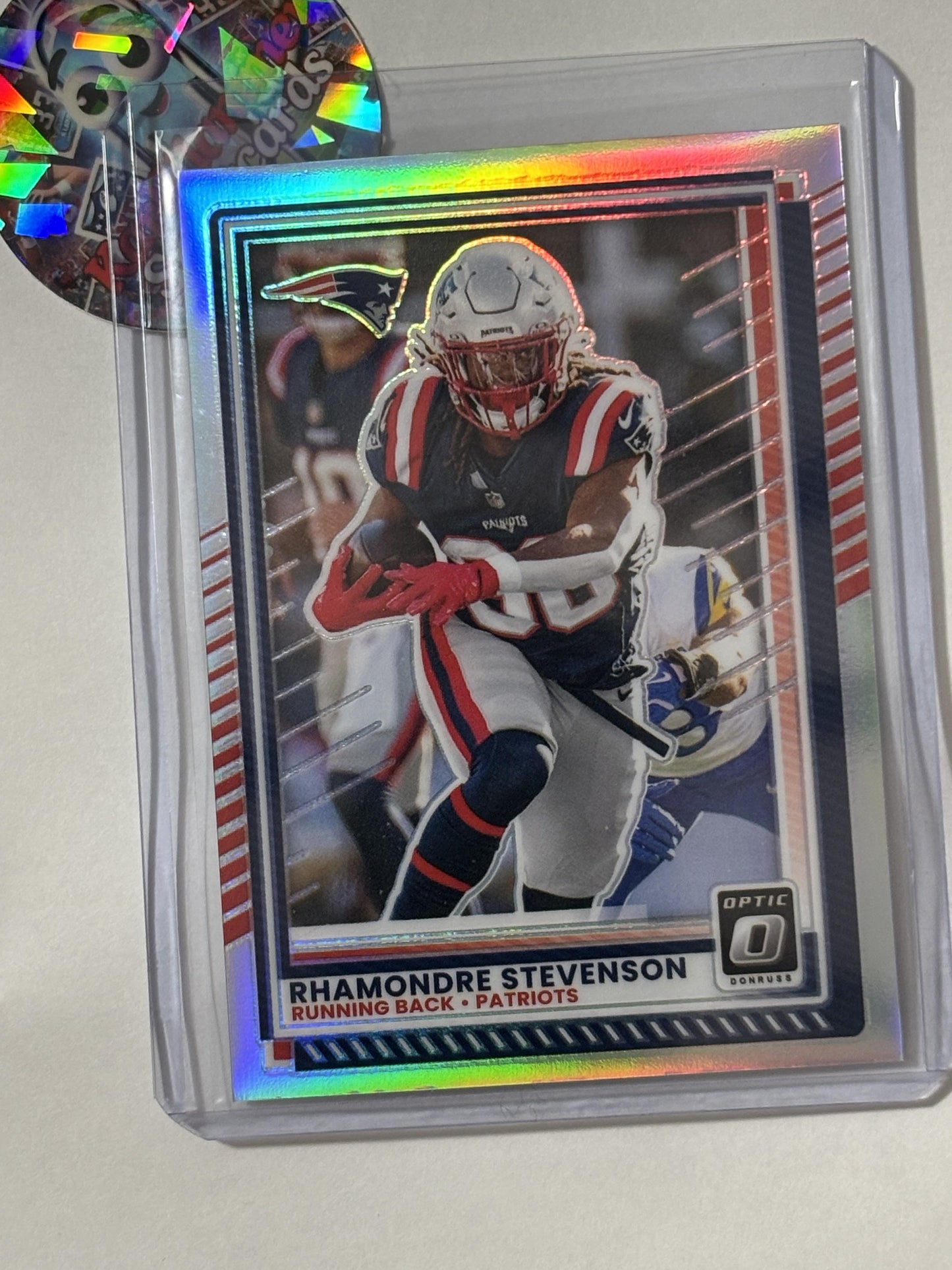 2025 Donruss Optic #51 Rhamondre Stevenson Holo New England Patriots