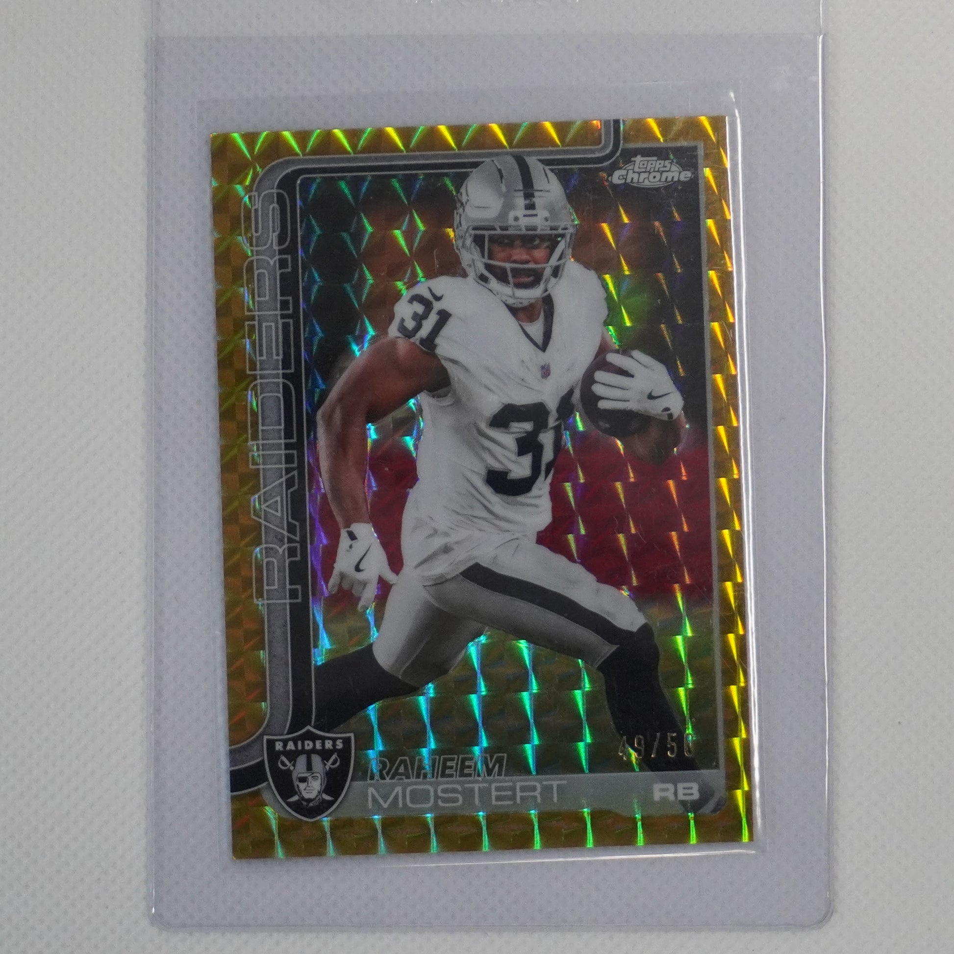 2025 Topps Chrome #182 Raheem Mostert Gold Geometric Refractor #/50 Raiders