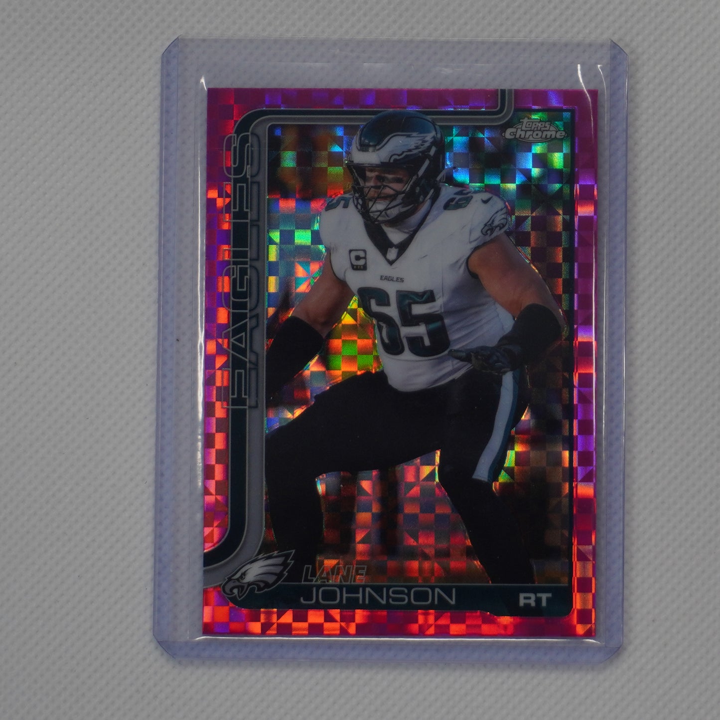 2025 Topps Chrome #246 Lane Johnson Hot Pink X-Fractor Philadelphia Eagles