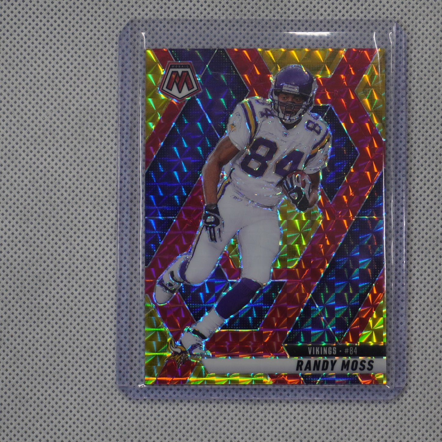 2025 Panini Mosaic #134 Randy Moss Mosaic Choice Red & Yellow #/89 Vikings