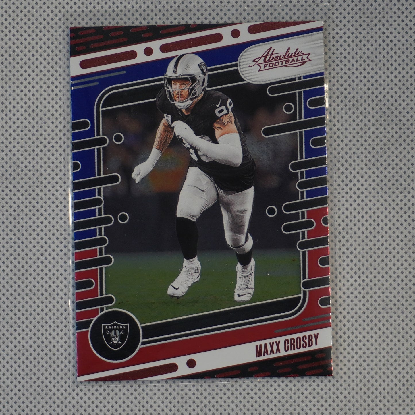 2024 Panini Absolute #56 Maxx Crosby Red and Blue Las Vegas Raiders