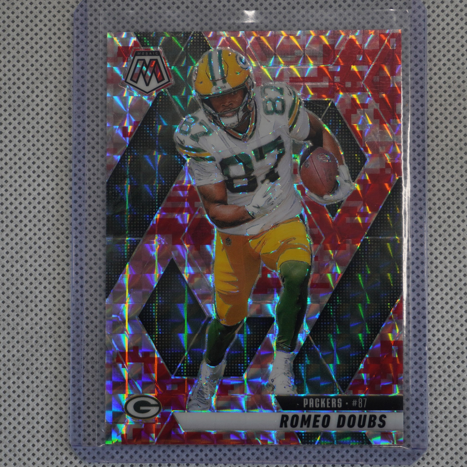 2025 Panini Mosaic #130 Romeo Doubs Mosaic Camo Pink Green Bay Packers