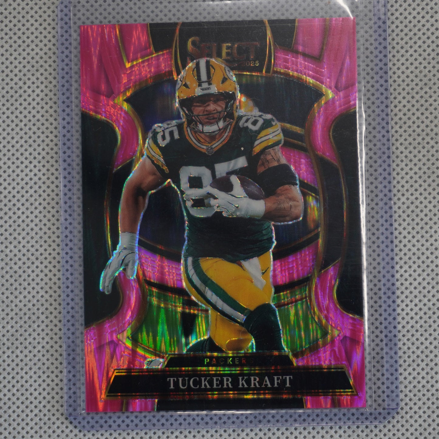 2025 Panini Select #68 Tucker Kraft Pink Prizm Shock Green Bay Packers