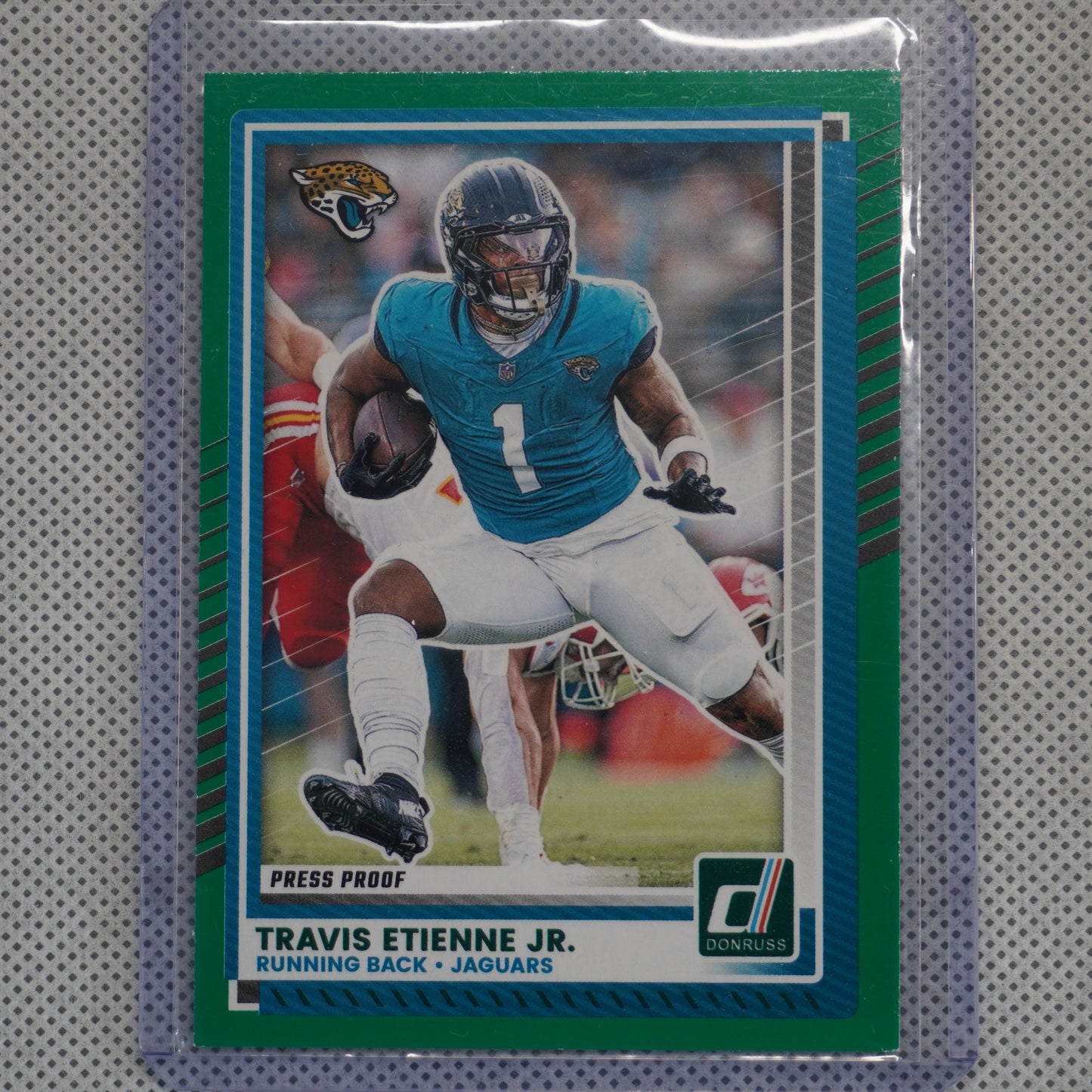 2025 Donruss #141 Travis Etienne Jr. Press Proofs Green Jacksonville Jaguars