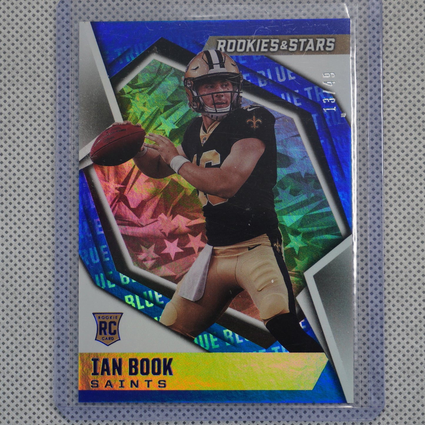 2021 Panini Rookies & Stars #127 Ian Book True Blue #/49 New Orleans Saints SN,RC