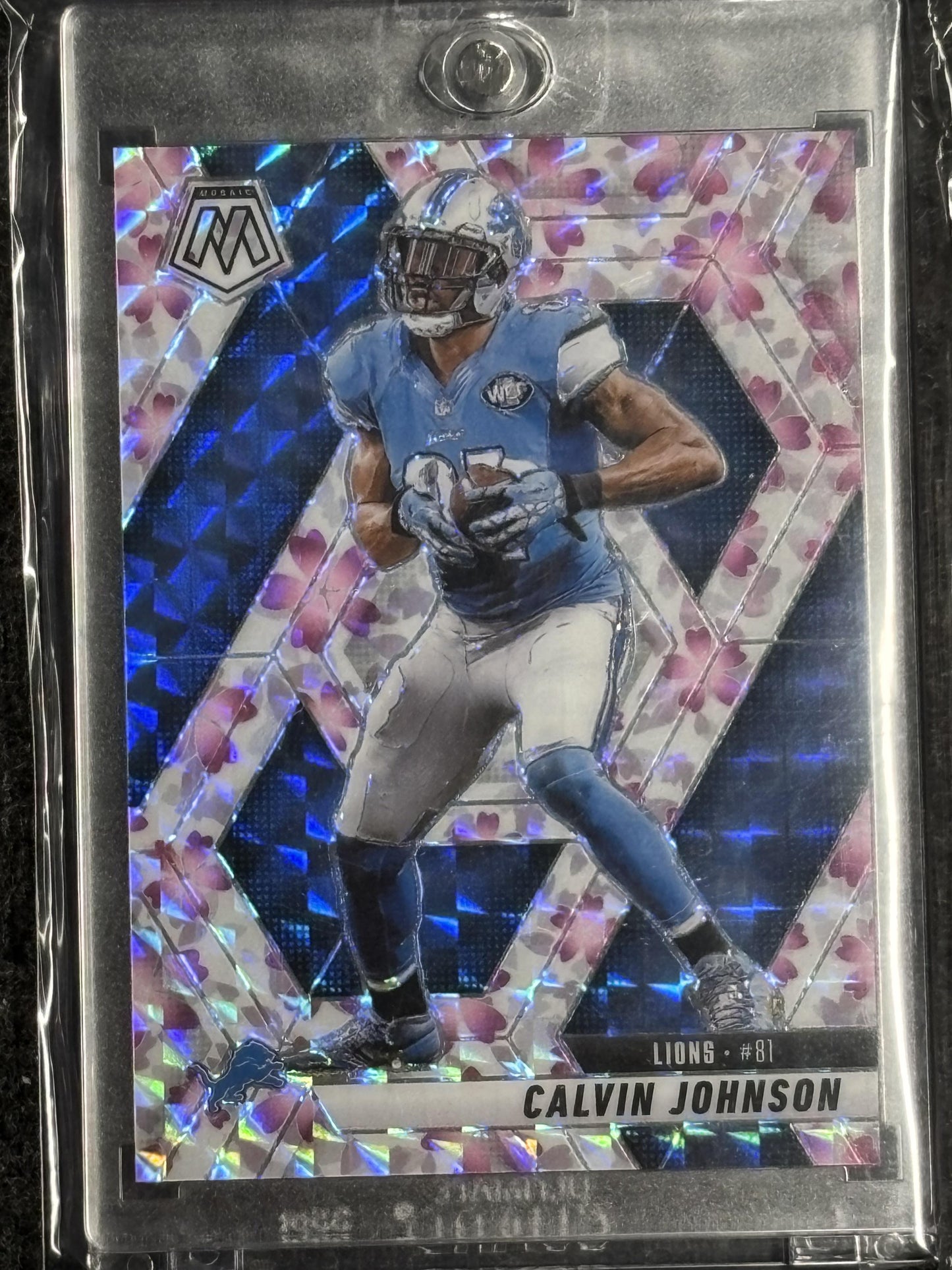 2025 Panini Mosaic #90 Calvin Johnson Mosaic Choice Cherry Blossom #/20 Detroit Lions SN
