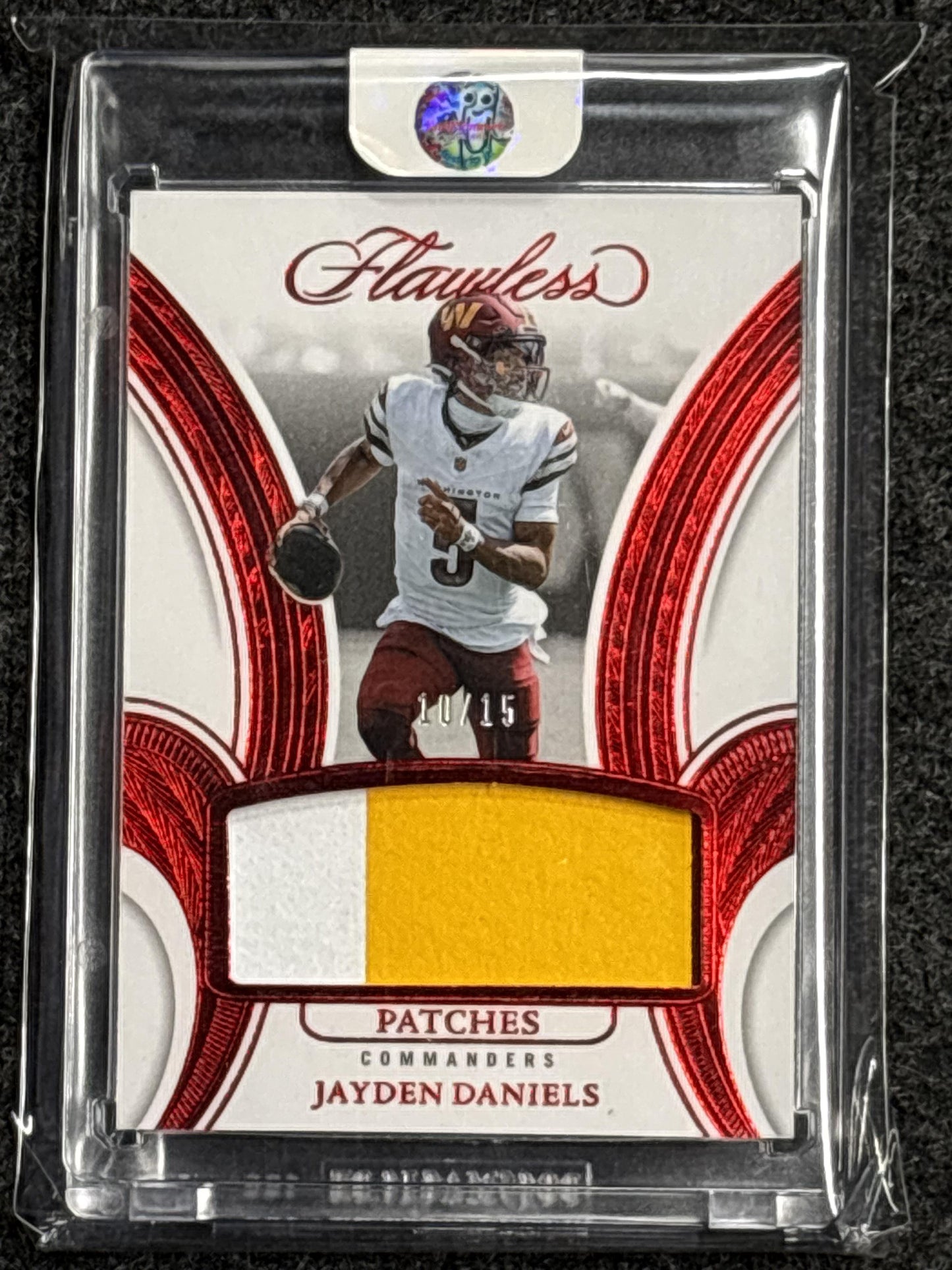 2025 Panini Flawless #PAT-JDS Jayden Daniels Patches Ruby #/15 Washington Commanders SN, MEM