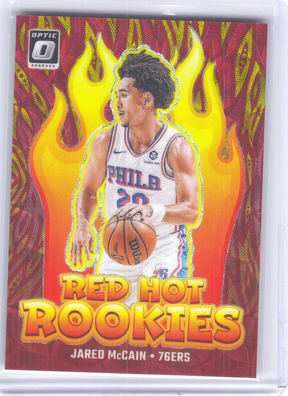 2024-25 Donruss Optic #12 Jared McCain Red Hot Rookies Red and Gold International #/99 Philadelphia 76ers SN