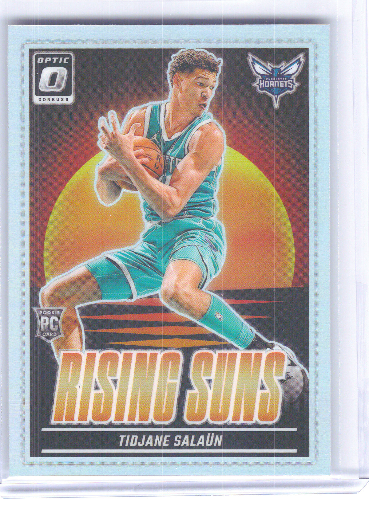 2024-25 Donruss Optic #12 Tidjane Salaun Rising Suns Holo Charlotte Hornets